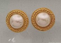 Front view showing both earrings with rope border and faux pearl centers