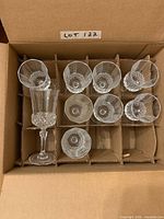 Box with ten crystal sherry glasses in cardboard dividers
