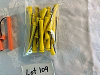 Sealed bag of yellow perm rods