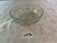 oblique view showing bowl profile and scalloped rim