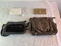 All four bags displayed together on table