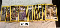 Front covers of all 13 National Geographic History magazines spread out