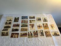 Full lot overview of postcards laid on table