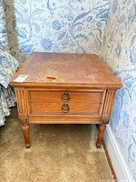 Full view of Carlton House end table showing drawers, legs and top