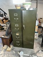 Front view showing four drawers and side locker