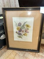 Full view of framed floral print with mat and frame