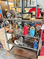 Overall view of shelving unit with all kitchen items