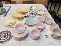 Group shot of all dinnerware pieces on table