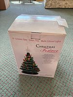 Retail box showing 16" ceramic Christmas tree with multicolored lights