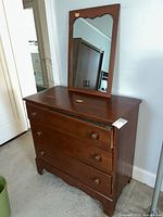Front view of dresser with mirror attached