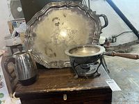 Group shot showing tray, chafing dish on stand, and coffee percolator