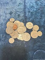 Pile of about 25 mixed Malaysian coins