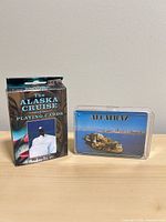 Both souvenir playing card decks side by side