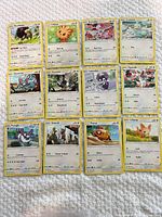 First spread of 11 different Pokémon cards