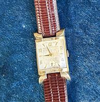 Front view of Bulova watch showing dial, case, strap