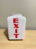 Front view showing EXIT lettering and overall shape