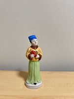 Front view of porcelain figure
