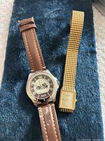 Roots wristwatch and Citizen wristwatch side by side