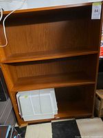 Front view showing entire three-tier bookcase