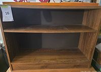 Front view showing adjustable shelf and overall construction