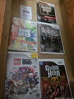 Group shot of all five Wii game cases in drawer