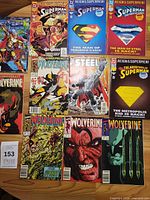 All eleven comic books laid out