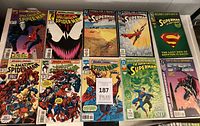 Ten comic books laid out front covers visible