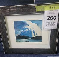 Front view of framed print with frame and auction tag visible