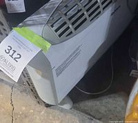 Front and side view of Rona convection heater showing top grill and labeling