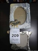 Front view of both photo frames showing design details and openings