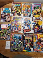 Overhead view of all ten Marvel comic books laid out on table