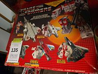 Back of original Transformers Superion gift set box showing five Aerialbot jet figures