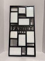 Full front view showing entire collage frame and openings
