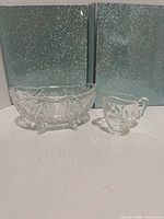 Overview of footed bowl and creamer together