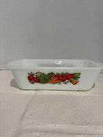 Side view showing vegetable decal and overall shape