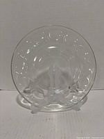 Full view of clear glass Pyrex bowl on stand