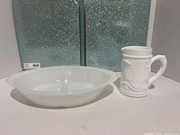 Pitcher and divided bowl side-by-side
