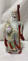 Full frontal view of Shou Lao porcelain figurine