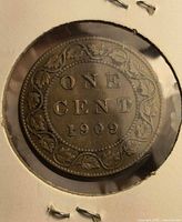 reverse side of 1909 Canadian large cent in flip