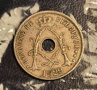 Obverse showing crowned monogram, ROYAUME DE BELGIQUE legend, 1929 date, center hole