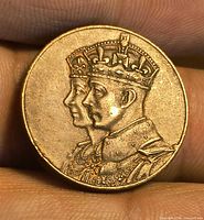Obverse showing crowned busts of King George VI and Queen Elizabeth