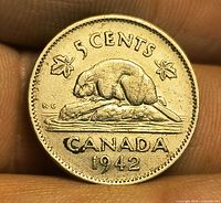 Reverse of 1942 Canada 5-cent coin showing beaver design and date