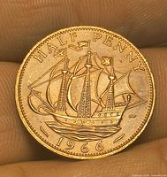 Reverse side showing Golden Hind ship and 1966 date