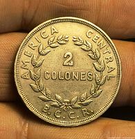 Reverse side showing 2 Colones denomination, wreath, legends