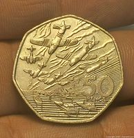 Reverse of the 50p coin showing aircraft and landing craft design