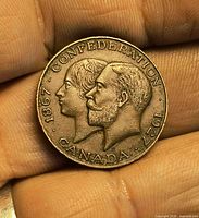 Obverse with conjoined busts and legends