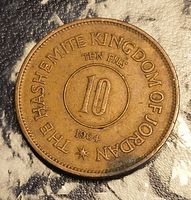 Obverse showing English legend, denomination and date