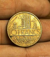 Obverse showing industrial motif and denomination 10 FRANCS