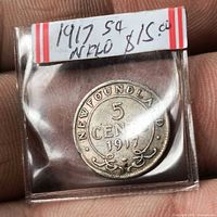 Reverse of 1917 Newfoundland 5 cents coin in plastic flip