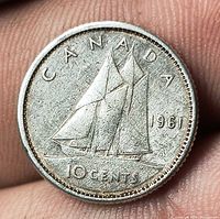Reverse of 1961 Canadian 10 cents coin showing Bluenose schooner and date